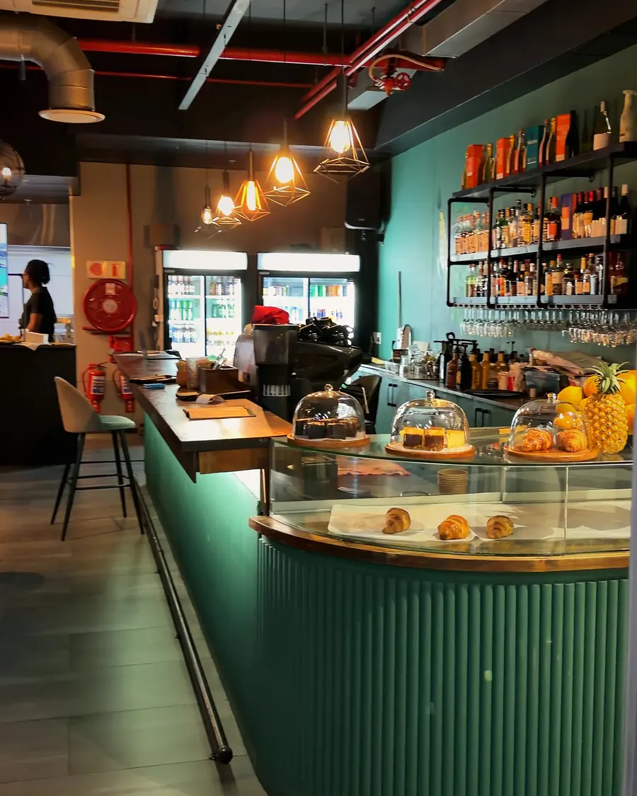 The green counter and coffee station