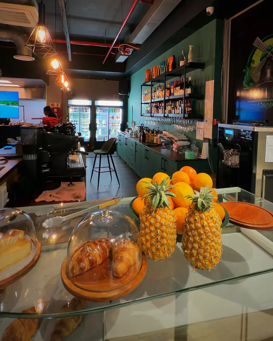 Pastries and fresh fruit on the counter